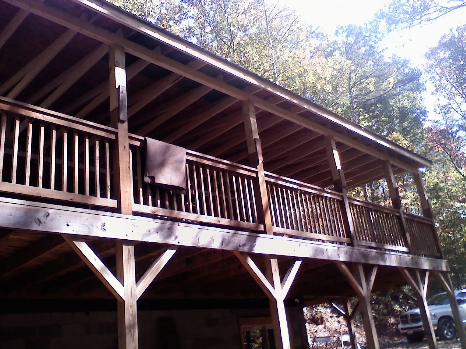 Timber framing under a new elevated porch and deck — Roof Leak Repair in Newton Lower Falls by Roofing Brothers